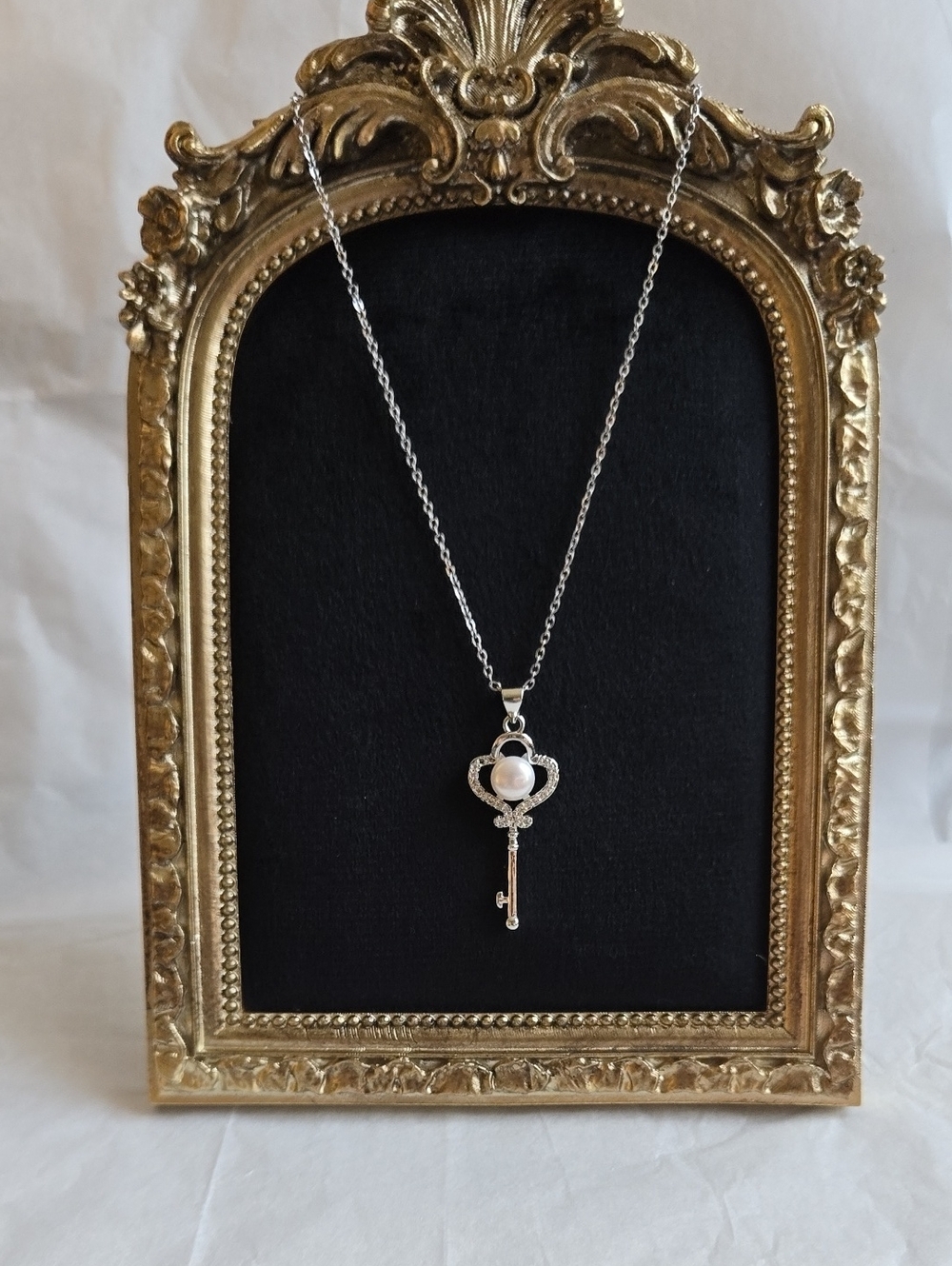 Sterling Silver Key Pendant Necklace with Genuine Freshwater Pearl In The Center